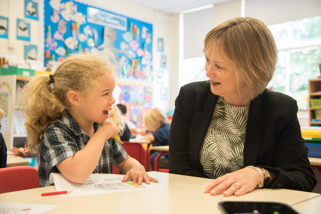 Mrs Gocher spending time in the Reception classroom