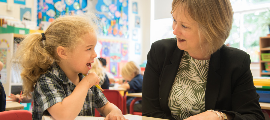 Mrs Gocher spending time in the Reception classroom
