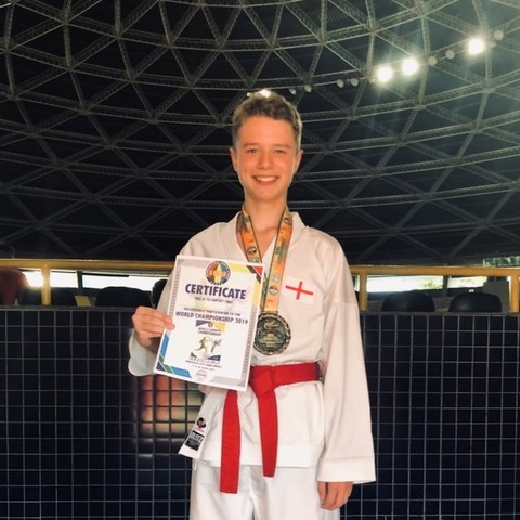 William at the IKU World Karate Championships with his bronze medal