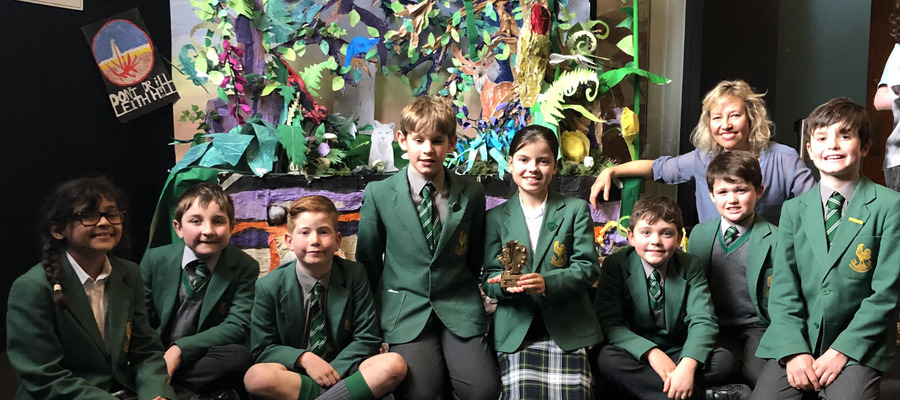 Mrs Lyth and pupil representatives with their winning display