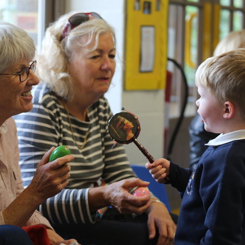 Arthur W enjoys singing songs with his Grandmothers