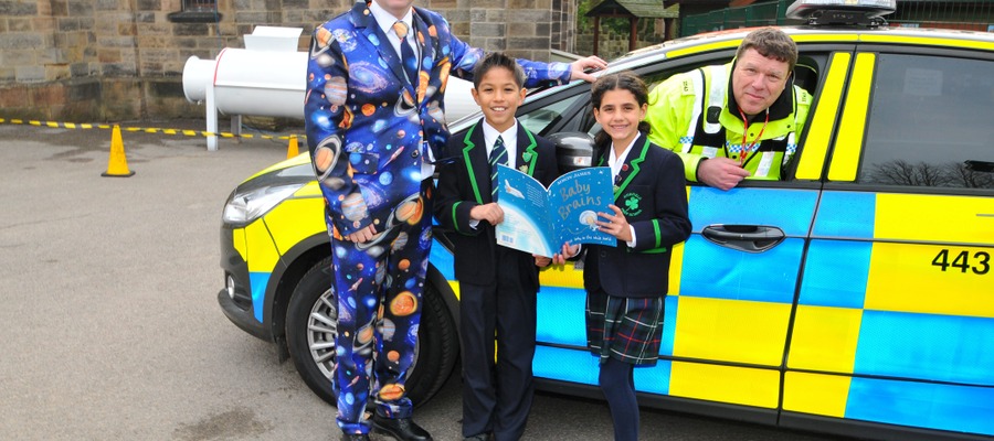 Head of Highfield Mr James Savile, Head Boy Nico Granillo, Deputy Head Girl Selin Gul and PC Rob Jessiman MOD Police