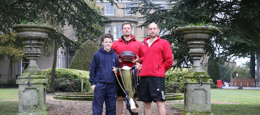 Holmwood's 1st VIII rugby captain, Hamish Irvine was thrilled to get his hands on the European cup. Pictured here with Mr Ed Cook, Director of Rugby a