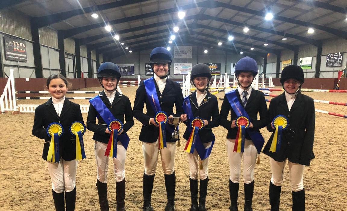 Kilgraston School pupils celebrating their success at the Strathallan School's showjumping competition where the teams won three out of the four class