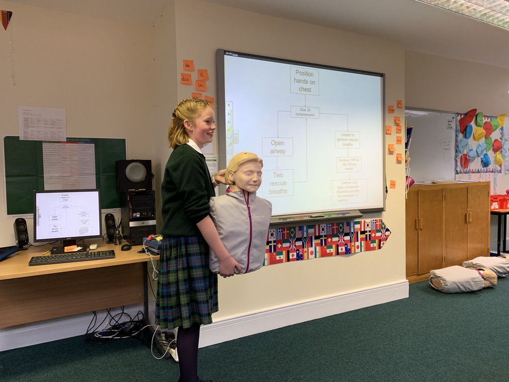 Rebecca Morrison from Kilgraston School Junior Years showing her classmates how to perform vital First Aid techniques.