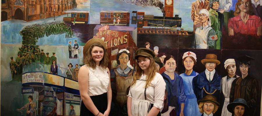 KEHS students admiring the commemorative mural during the Armistice Centenary celebration