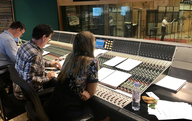 Edward in studio on solo movements working to conductor on video screen