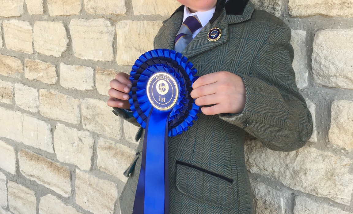 Ellie with her 1st prize rosette