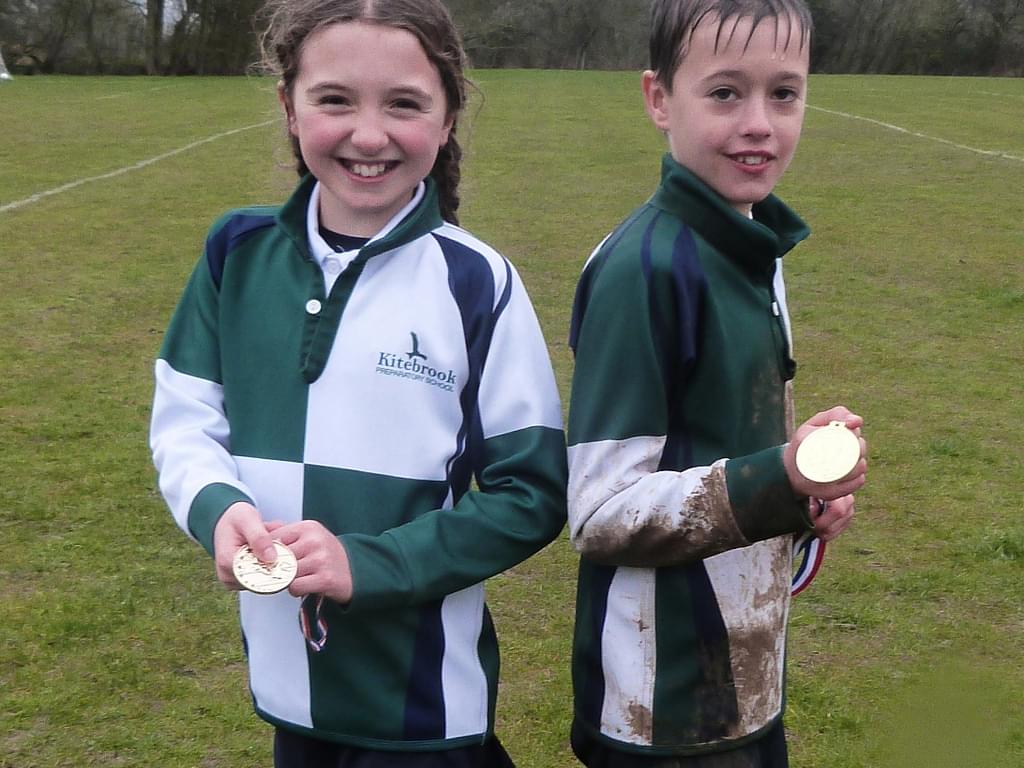 Olivia and Bertie celebrating their cross country success