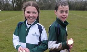 Olivia and Bertie celebrating their cross country success