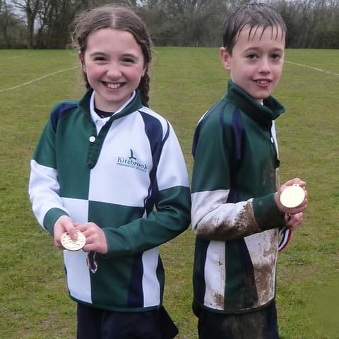 Olivia and Bertie celebrating their cross country success
