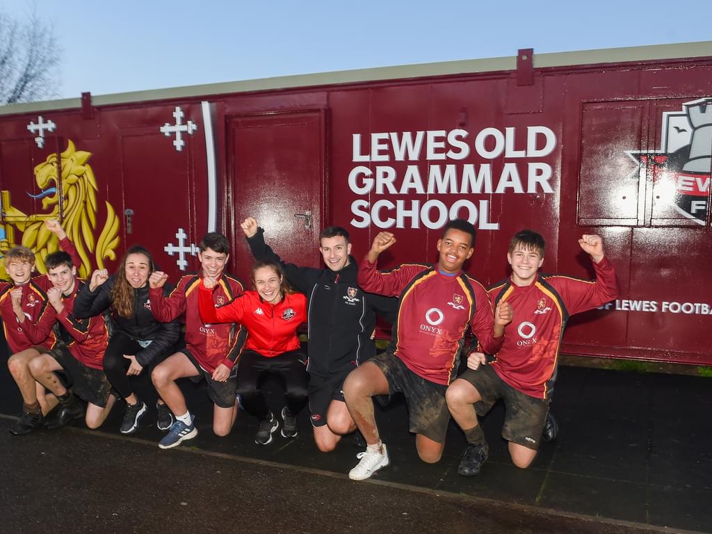 Pupils in Lewes FC players celebrate