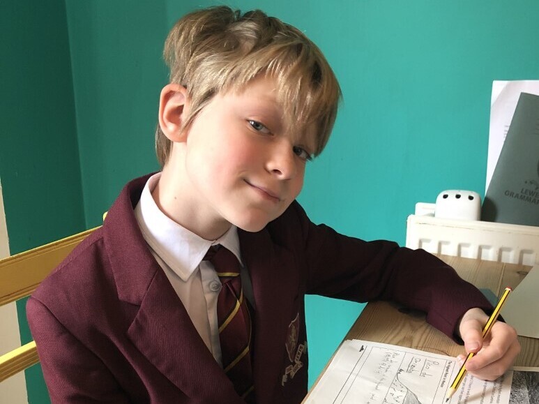 Alfie Prior in his uniform at home