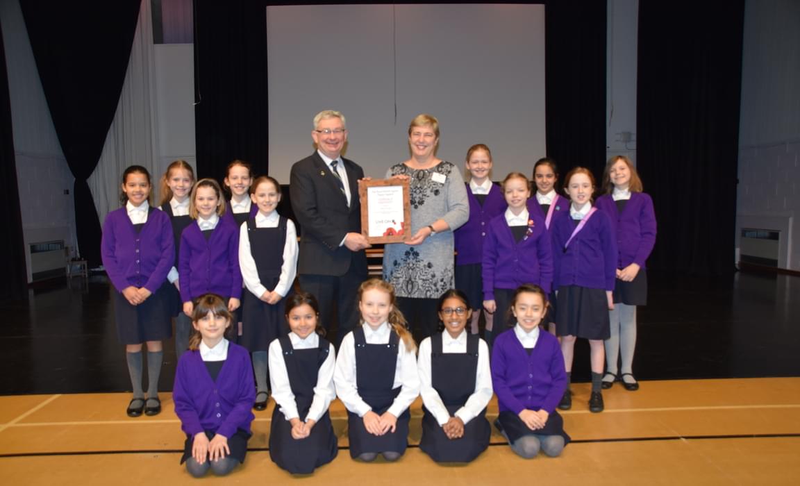 Receiving Certificate of Appreciation from the Royal British Legion