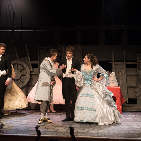 Christian Loizou (centre) played the part of Marius with Matthew Phillips (left) and Jemima Gray as the Thénardiers.