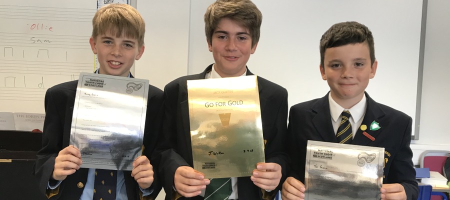 The Guerin brothers – Harry, Jack and Tom - with their Kodály musicianship certificates.