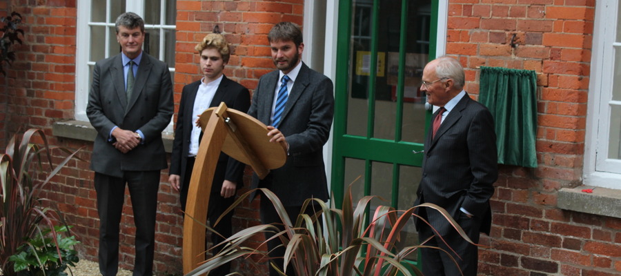 Headmaster Charlie Minogue with Mr Bury of the Millichope Foundation, Henry Kennedy and Julian Rogers Coltman
