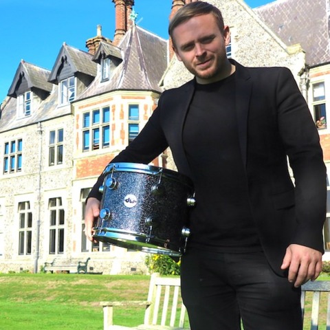 Ben Thompson, drummer for the chart-topping band Two Door Cinema Club, pictured outside Sompting Abbotts