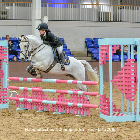 Emi riding her horse Flash to become national champion at 80cm