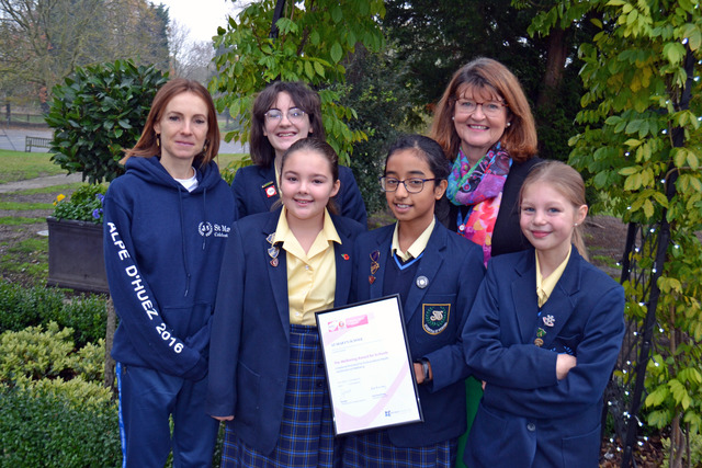 Miss Jo Middleditch, Wellbeing and Resilience Co-ordinator (left) and Mrs Hilary Vipond, Principal (right) with St Mary’s Lower and Senior School girl