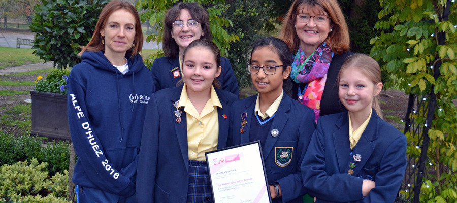 Miss Jo Middleditch, Wellbeing and Resilience Co-ordinator (left) and Mrs Hilary Vipond, Principal (right) with St Mary’s Lower and Senior School girl
