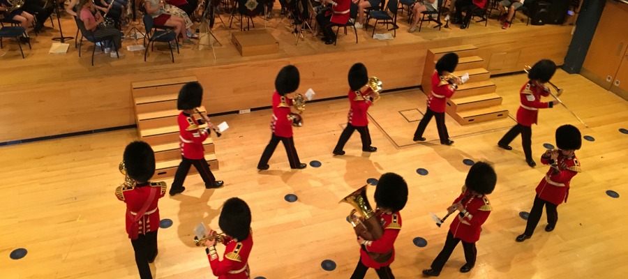 The Band of the Scots Guards and young Hampshire musicians at St Swithun's school