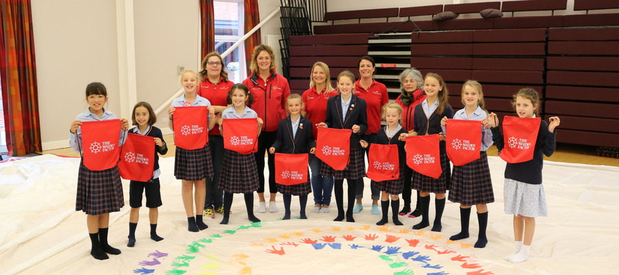 Pupils from St Swithun’s Prep School placed their handprints on one of Maiden’s spinnaker sails.
