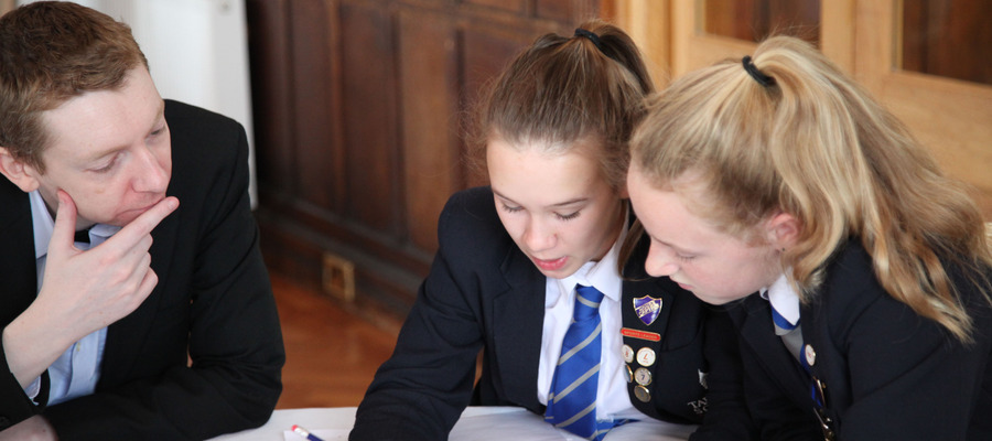 Dr James Grime with Taunton School pupils