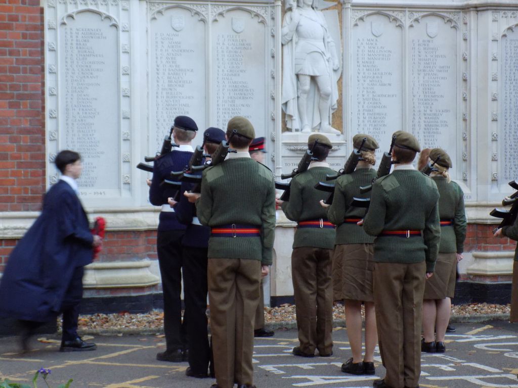 The Honour Guard laying wreaths at The Leys War Memorial