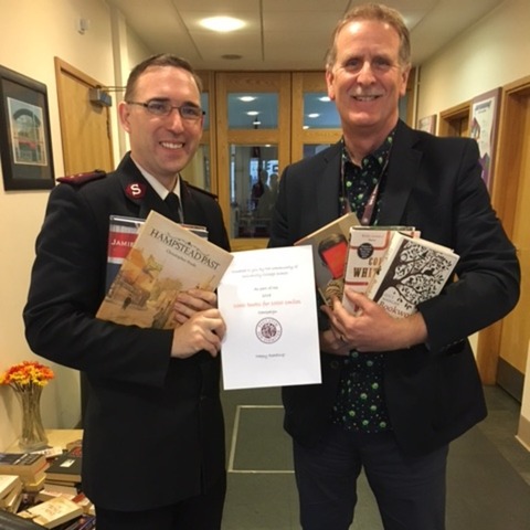 Head of Sixth Form at University College School, Russell Chapman, in action delivering some of the books donated by the UCS community.