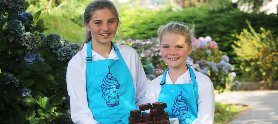 11-year-old best friends, Plum and Daisy, who have won a national enterprise award